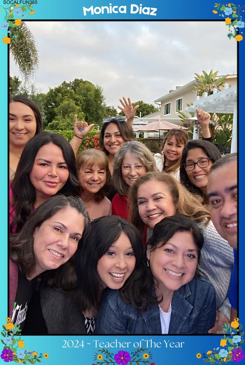 A group of friends waving and smiling in the SoCalFun365 photo booth