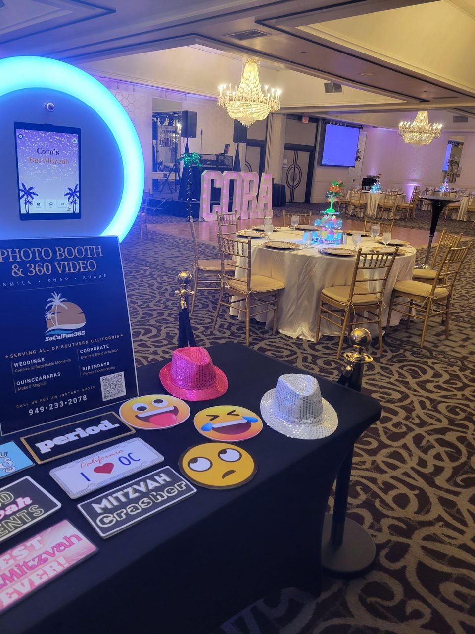 A SoCalFun365 photo booth set up in a hotel ballroom before an Orange County celebration